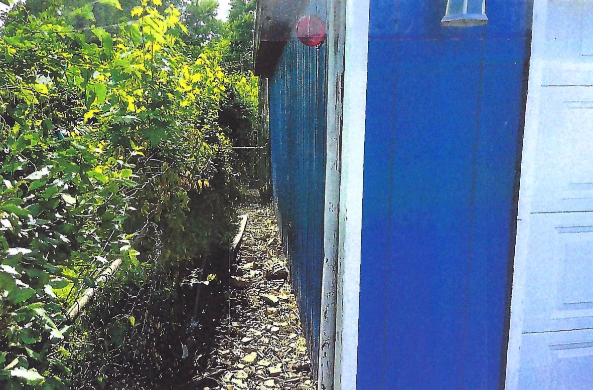 Fence Line Along 25th Street - After