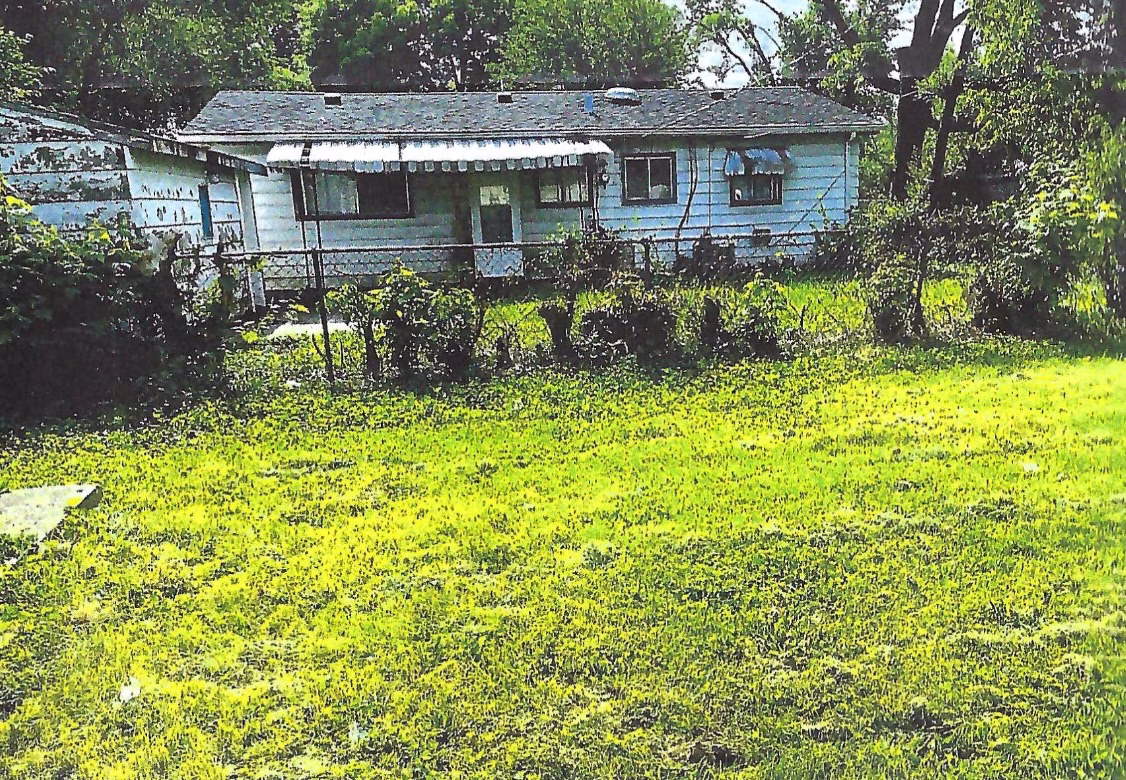 Fence Line Along 25th Street - After